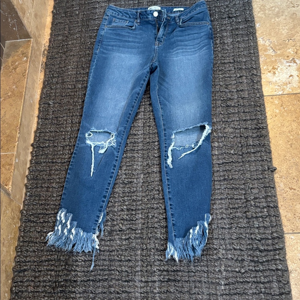 Distressed Blue Jeans with Frayed Hem